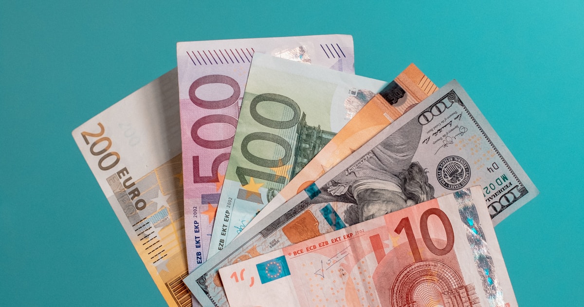 Mobile phone showing payment checkout screen with UAE dirham currency and multiple payment options