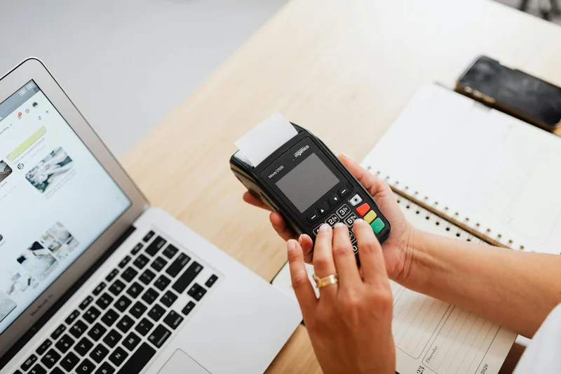 Philippine ecommerce merchant comparing BNPL payment provider options on a laptop