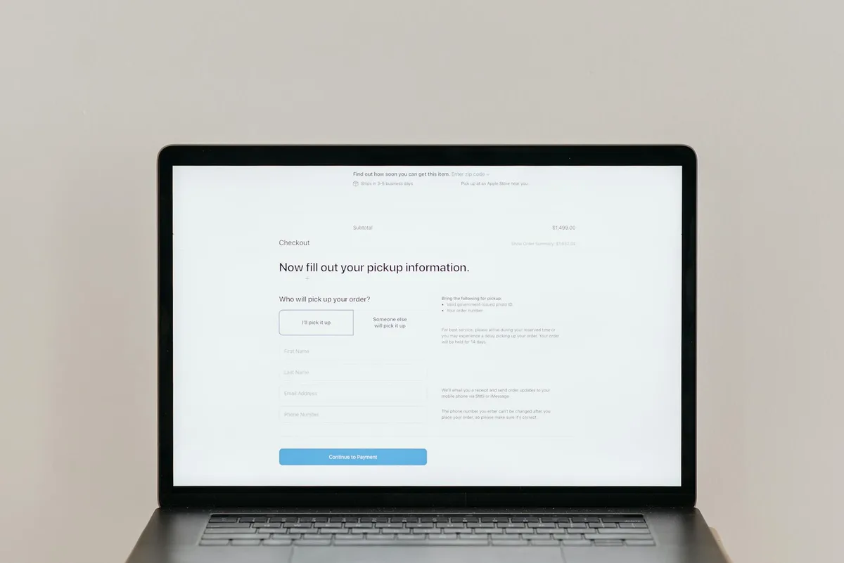 UAE ecommerce seller reviewing payment gateway options on laptop with AED transaction data on screen